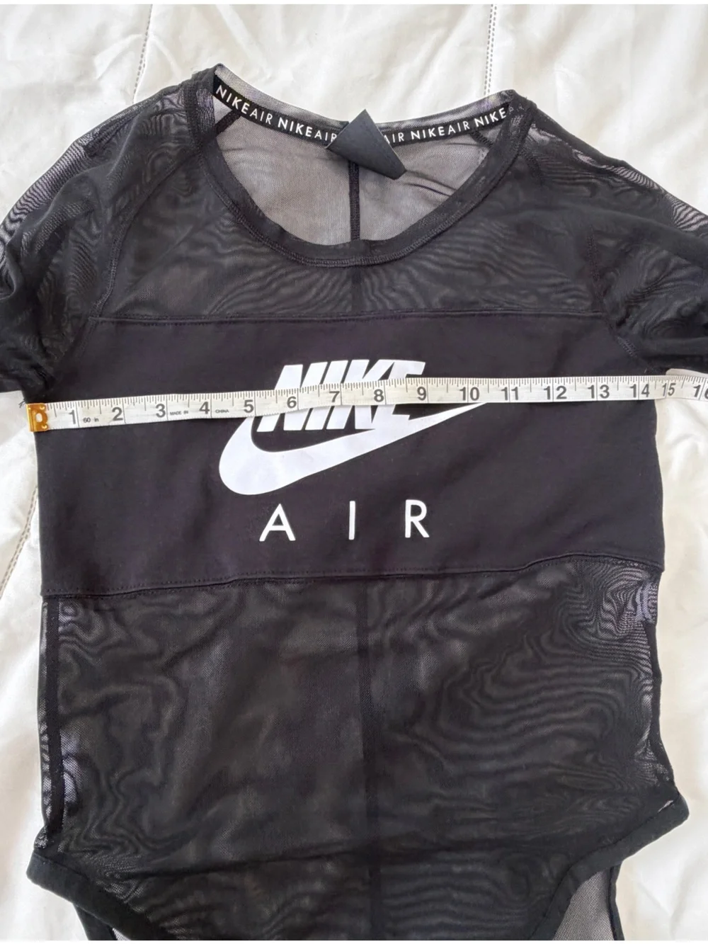 Nike Air women’s  long sleeve mesh bodysuit
